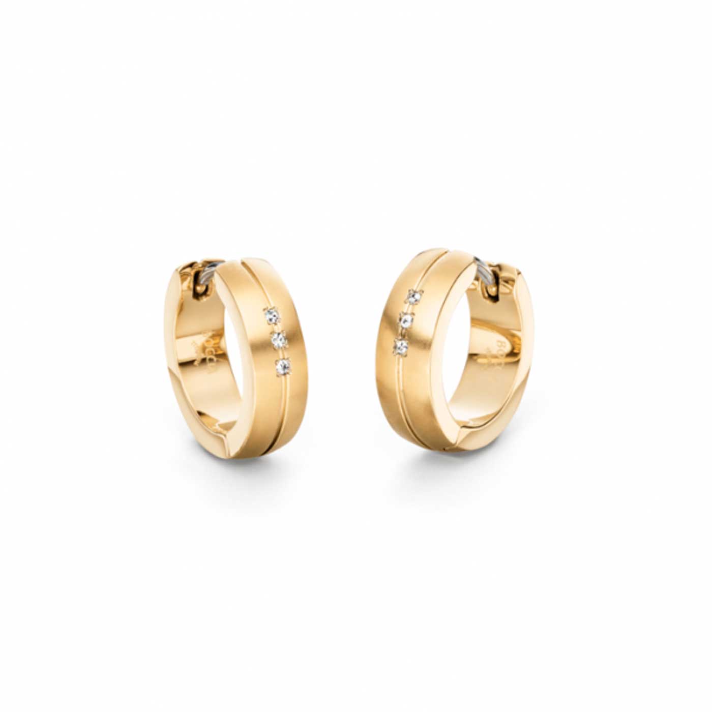 Aros de titanio en tono dorado con 6 pequeños diamantes