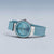Reloj Bering para mujer con esfera azul y correa de silicona turquesa, lateral