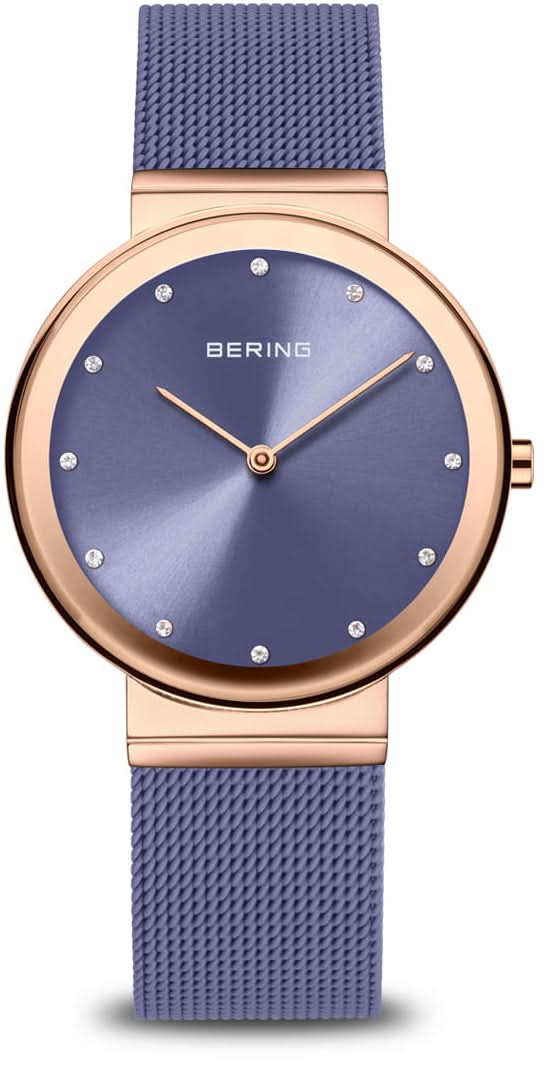 "Reloj de mujer con esfera azul, caja en tono oro rosa y correa milanesa azul"