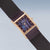 Reloj Bering para mujer con caja rectangular, esfera violeta y bisel con incrustaciones de piedras