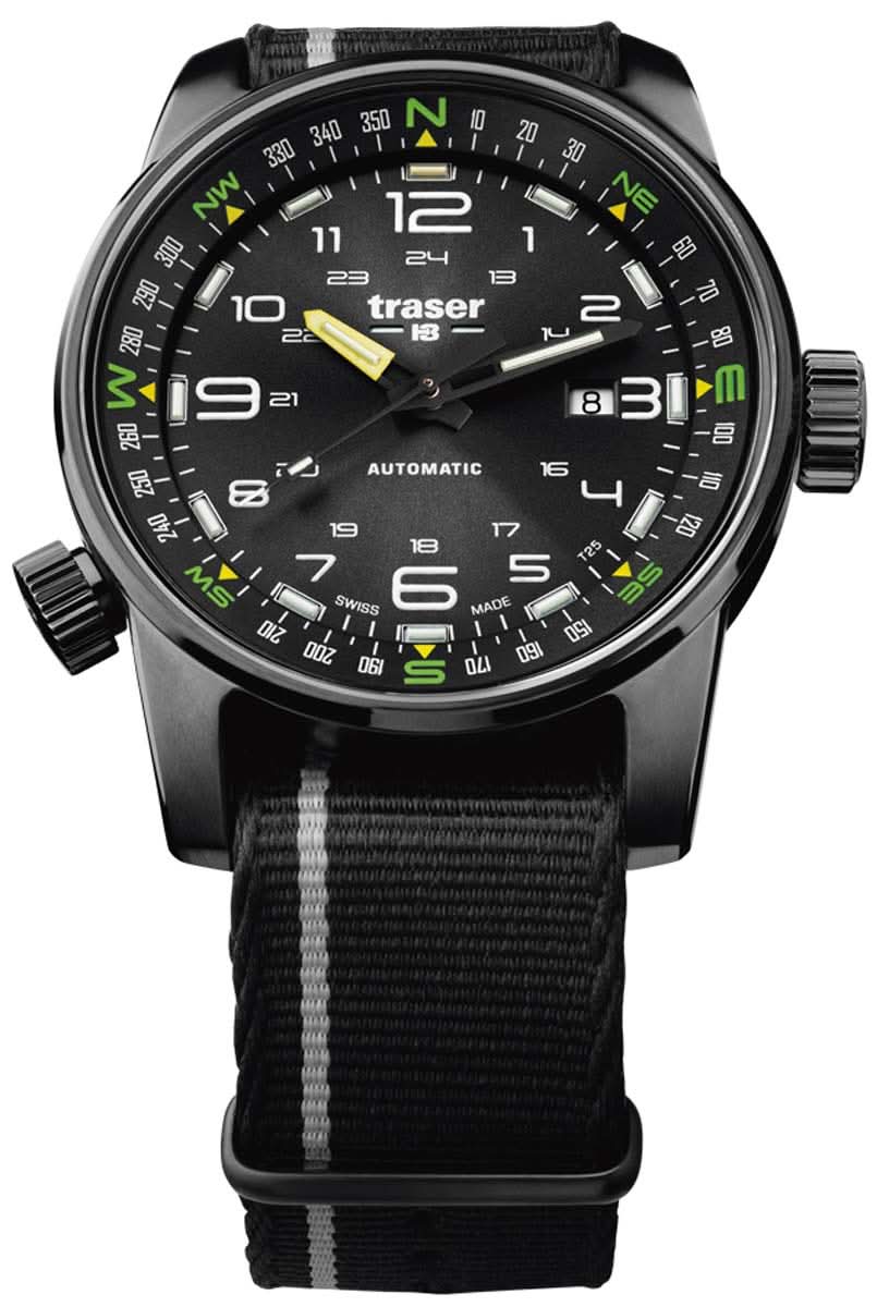 Reloj de hombre con esfera negra, marcadores luminosos verdes y correa textil negra