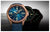 "Dos relojes de hombre: esfera azul con correa de cuero, pantalla luminosa negra en la parte posterior"