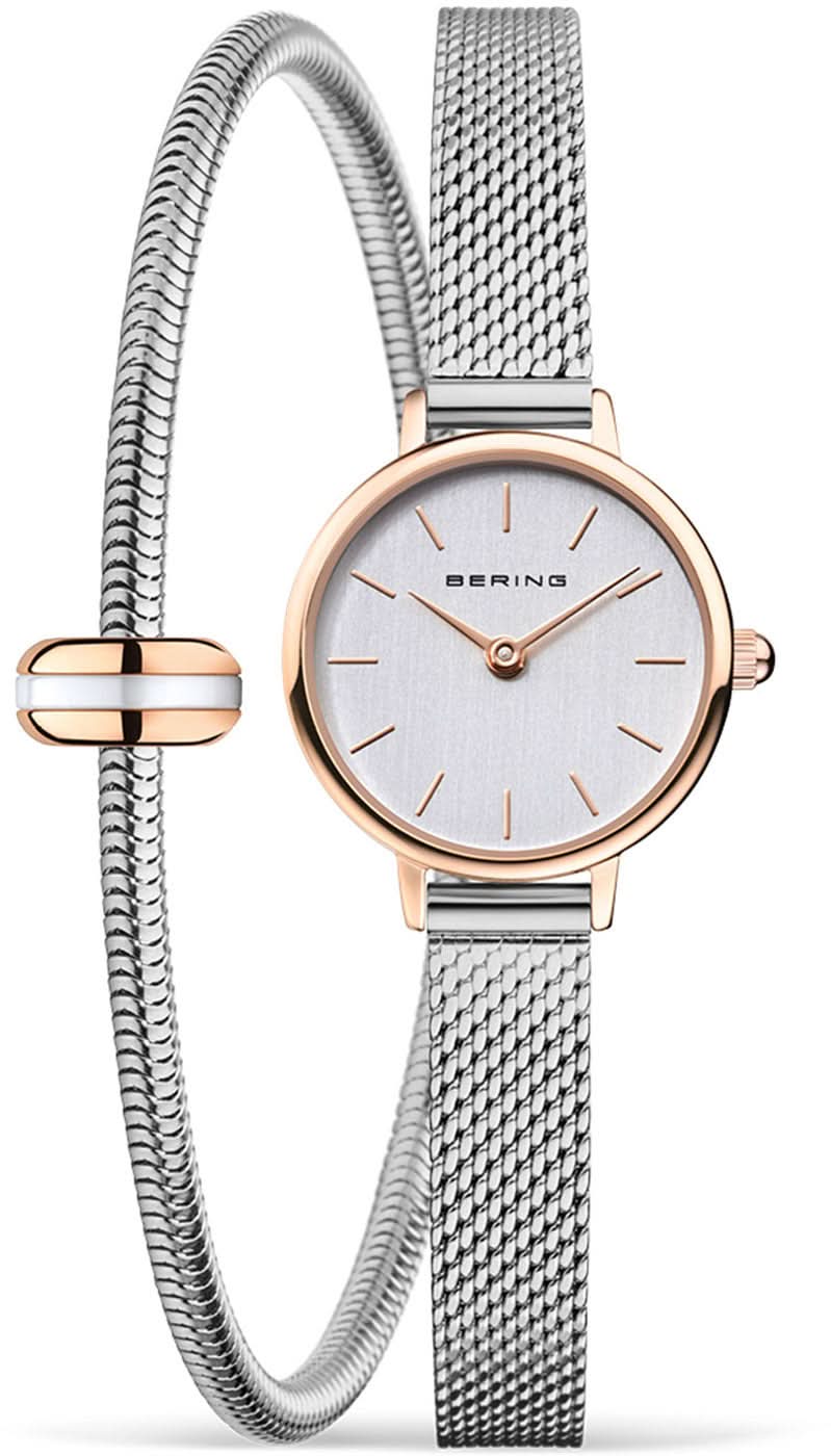 "Reloj de mujer: caja en tono oro rosa, esfera clara y brazalete milanés (malla fina)"