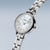 Reloj Bering para mujer con brazalete de metal plateado, esfera de nácar y corona