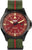 Reloj de hombre con correa de tela verde y caja negra, esfera roja con logo traser