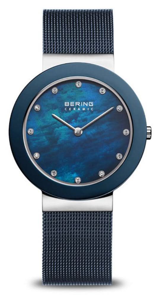 Reloj Bering para mujer con esfera azul, bisel redondo de cerámica y correa de malla
