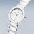 Reloj Bering para mujer, esfera plateada inclinada con rayos e índices de bastón, correa de metal