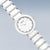 "Reloj de mujer Detalle: esfera blanca con índices de piedras y brazalete de cerámica"