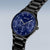 Reloj de hombre con esfera azul y subesferas, brazalete de metal negro