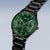 Reloj de hombre en negro con caja redonda, esfera verde y pulsera de cadena negra