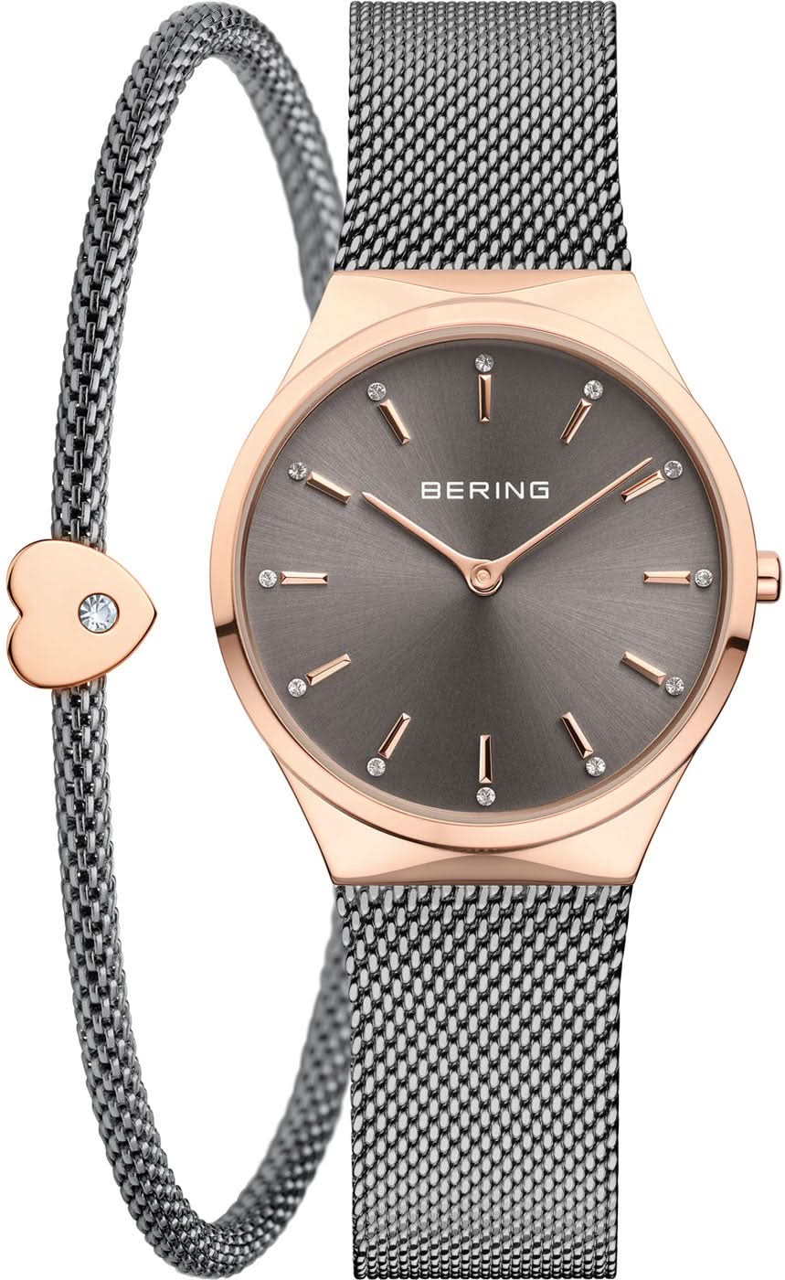 Reloj de mujer con esfera gris oscuro, bisel en oro rosa y correa milanesa, colgante de corazón