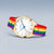 "Reloj de mujer con esfera blanca y pulsera de arcoíris rojo"
