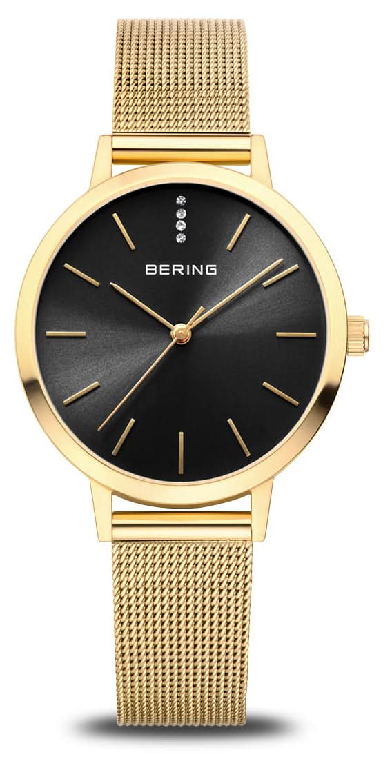 "Reloj de mujer con pulsera milanesa dorada, esfera negra e índices de bastón"