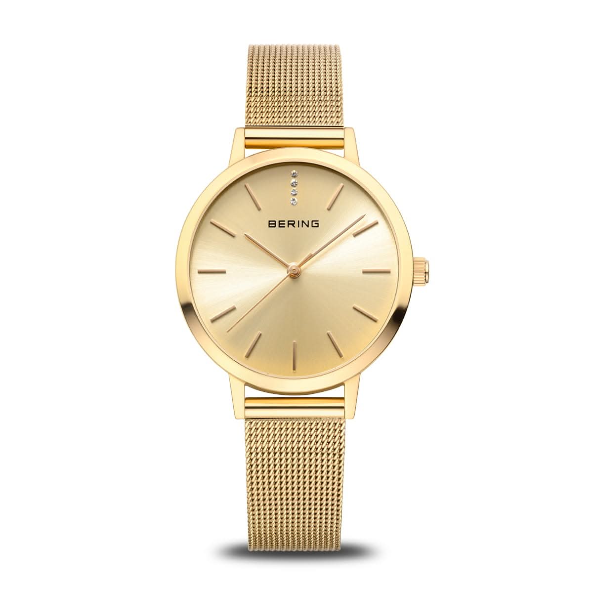 "Reloj de mujer con caja redonda dorada, esfera color champán y correa de malla"