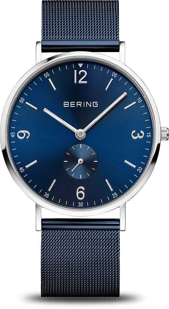 Reloj Bering para hombre con esfera azul, índices blancos y correa de malla azul