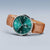Pulsera para hombre: esfera verde, correa de cuero marrón, caja plateada.