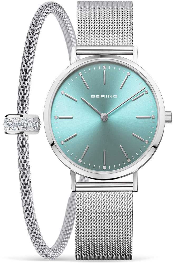 Reloj de mujer con esfera turquesa y correa milanesa plateada, cristal de zafiro redondo