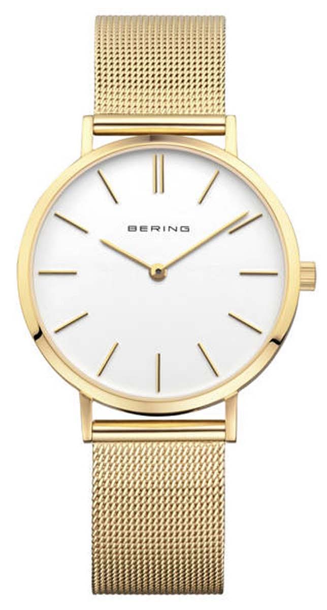 "Reloj de mujer con esfera blanca y pulsera milanesa dorada"
