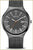 Reloj solar para hombre: esfera negra, correa Milanesa, caja redonda de acero inoxidable