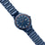 Pulsera de hombre en diagonal desde arriba: esfera azul con bisel naranja