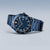 Reloj solar para hombre con brazalete de metal azul, esfera azul oscuro con índices
