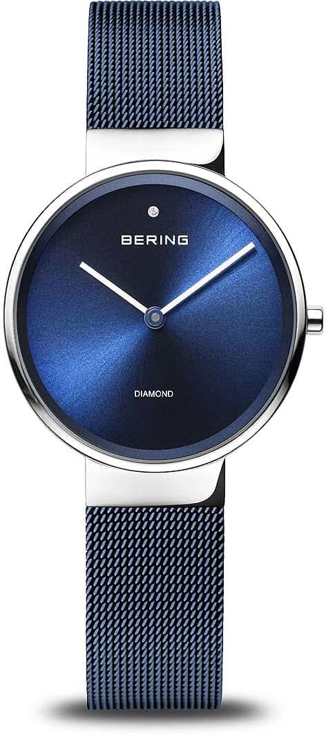 "Reloj de mujer con esfera azul y correa milanesa azul oscuro, caja redonda de acero inoxidable"