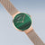 Reloj Bering para mujer con esfera verde a rayas y pulsera de malla en tono oro rosa