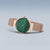 Reloj Bering para mujer con esfera verde y pulsera de metal en tono oro rosa