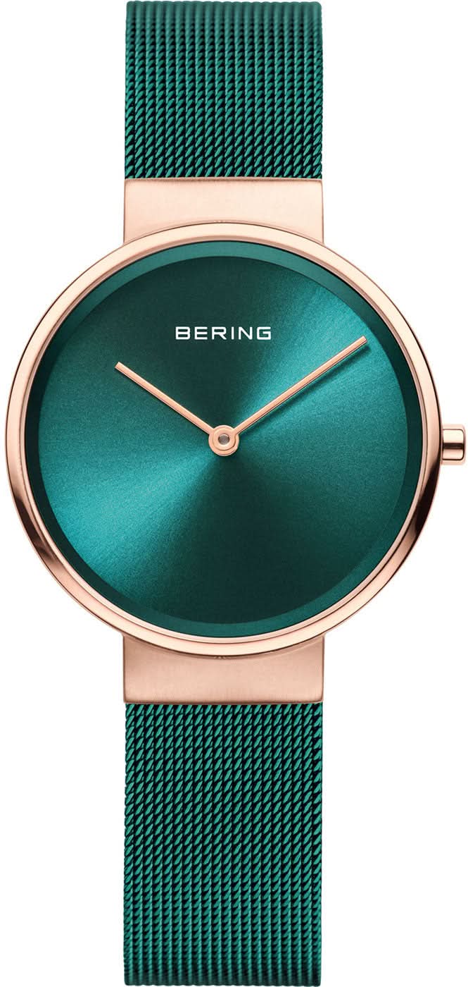 Reloj Bering para mujer: correa milanesa verde, esfera verde esmeralda y bisel en tono oro rosa.