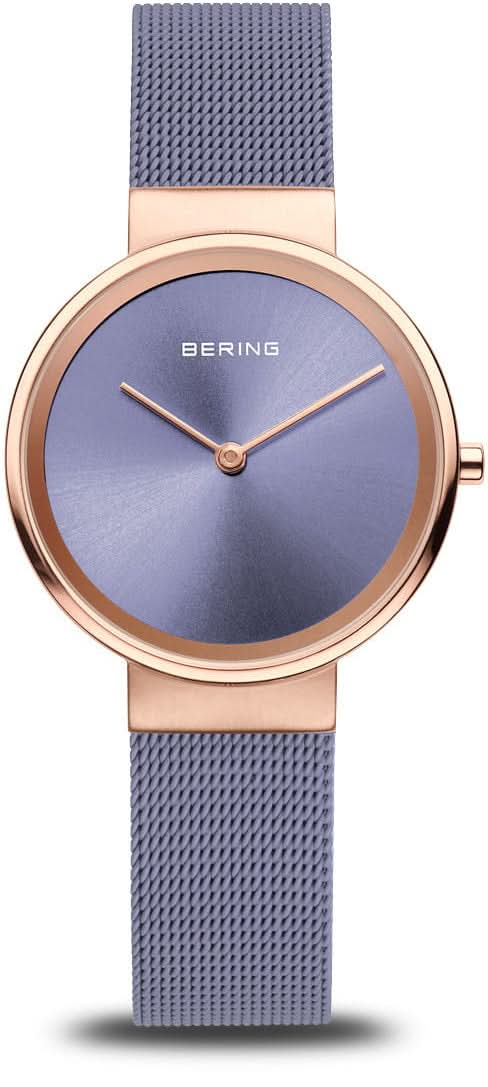 Reloj de mujer: caja de oro rosa, esfera azul con manecillas, pulsera milanesa azul