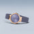 "Reloj de mujer con pulsera de malla en tono oro rosa, bisel en tono oro rosa y esfera azul"