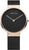"Reloj con esfera negra, bisel de oro rosa y correa milanesa negra"