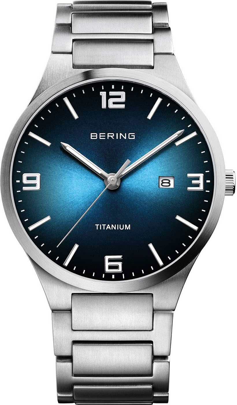 Reloj Bering para hombre de titanio con esfera azul y correa de metal plateado
