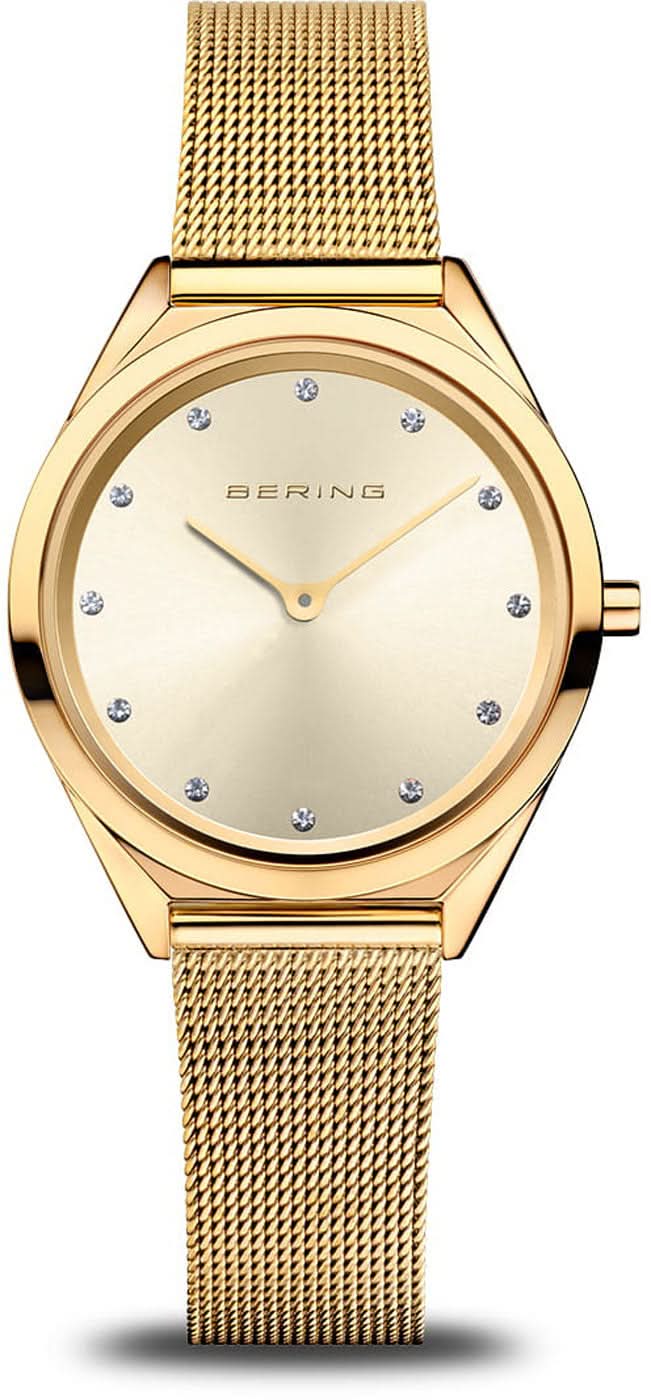 Reloj Bering para mujer con esfera beige, bisel dorado y correa Milanesa