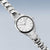 Reloj Bering para mujer, acero inoxidable delgado, pulsera plateada, esfera blanca texturizada