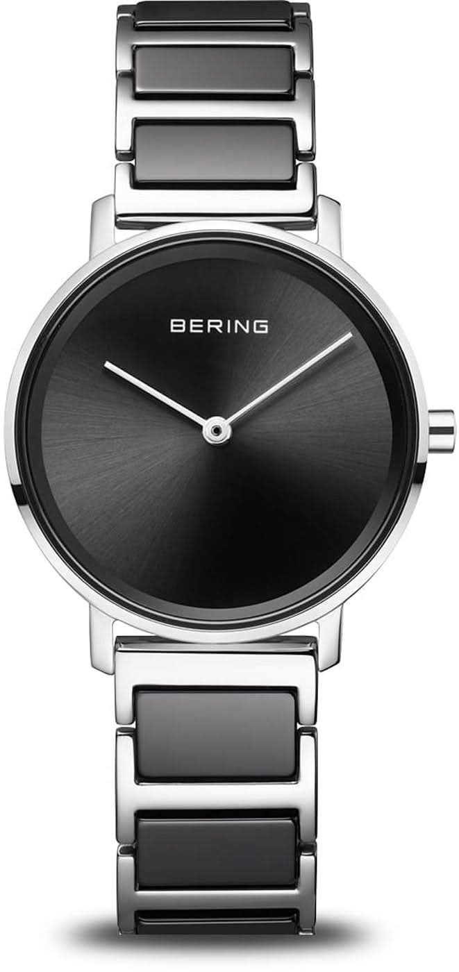 "Reloj de mujer con esfera negra y pulsera de eslabones plateados con rectángulos oscuros"