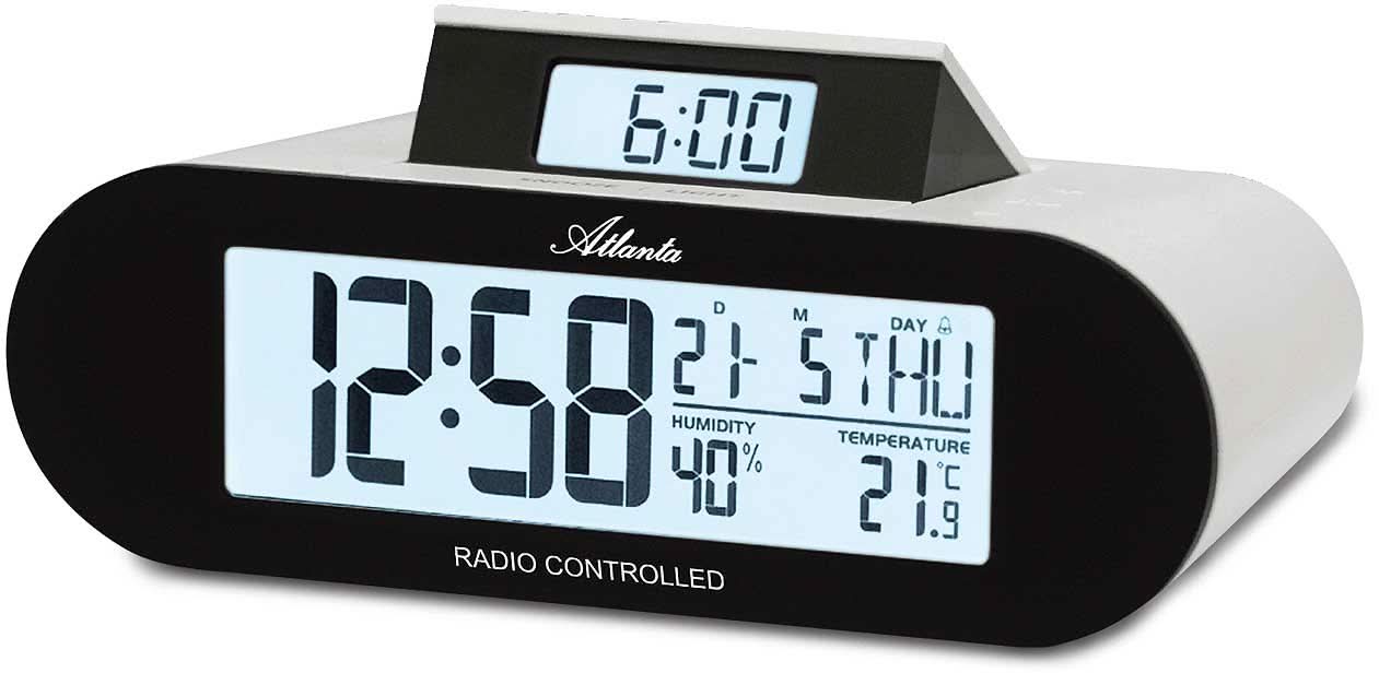 Radio despertador digital con pantalla grande; muestra hora, fecha, temperatura y humedad.