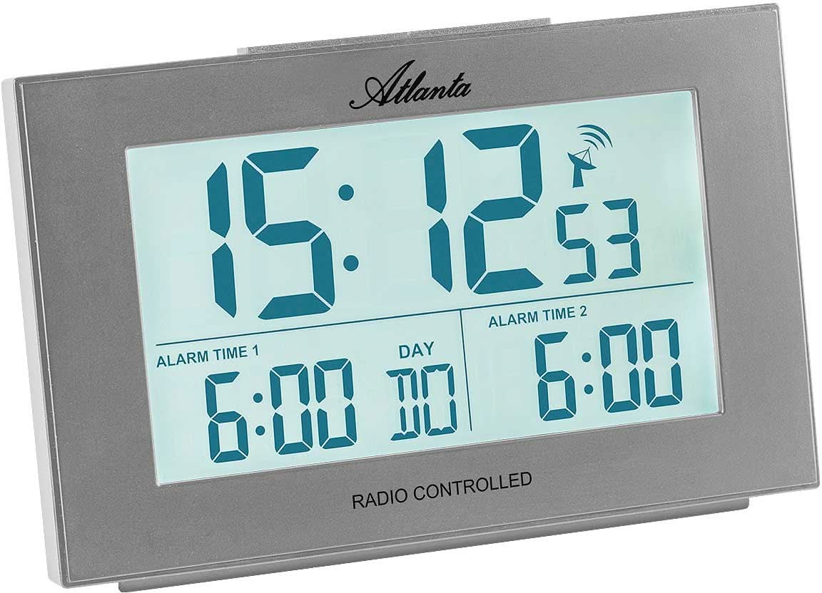 Despertador digital inalámbrico con pantalla LCD azul, carcasa gris y pantalla de alarma