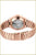 "Reloj de mujer con pulsera de oro rosa, fondo de caja transparente con movimiento visible"