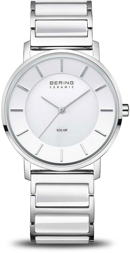 "Reloj de mujer con esfera blanca, bisel redondo y brazalete de cerámica plateada, solar."