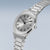 Reloj Bering para mujer con caja plateada, esfera redonda y corona lateral