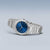 Reloj Bering para mujer: esfera azul, pulsera de acero inoxidable plateado, caja con bisel redondo