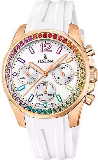 "Reloj de mujer con correa de caucho blanco, bisel dorado con piedras de colores y cronógrafo."