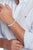 En la muñeca: Pulsera de eslabones de acero inoxidable con relieve Tommy Hilfiger, eslabones plateados
