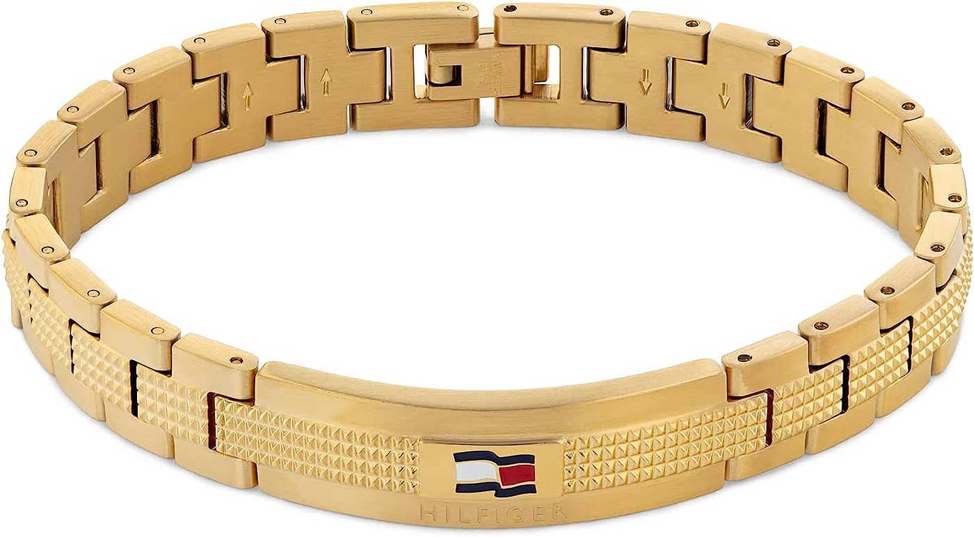 Pulsera de eslabones de acero inoxidable en tono dorado con logo y charm de bandera