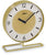 Reloj de mesa redondo con marco dorado, esfera blanca, números negros, soporte