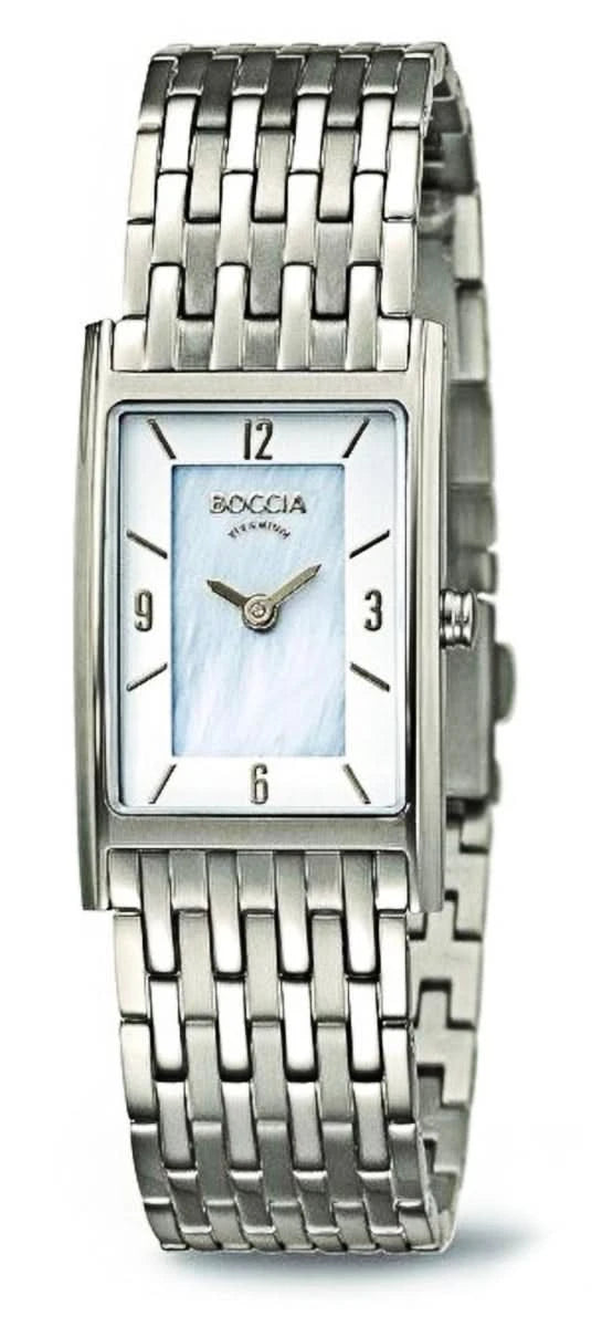 "Reloj de mujer con correa de metal y esfera rectangular, plateado, con números del 1 al 12"