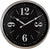 "Reloj de pared con esfera negra, números grandes, marco de metal, logo Nextime"