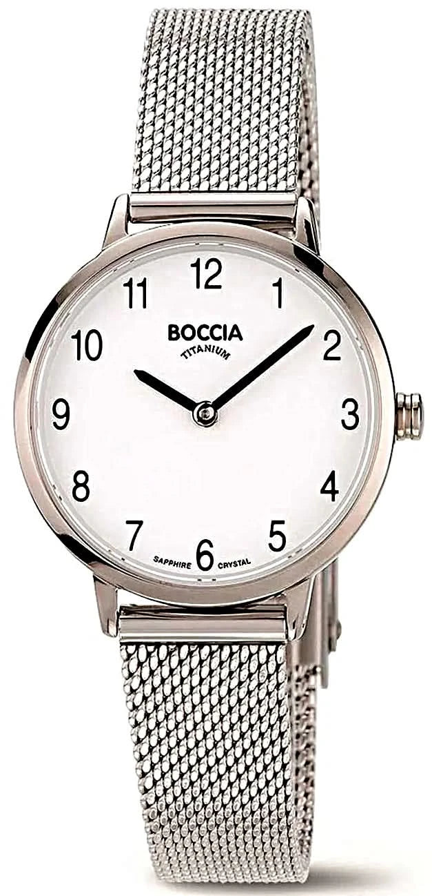 "Reloj de mujer con correa de malla plateada, esfera redonda con números romanos y manecillas"