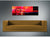 Reloj de pared moderno en panel rectangular de aluminio con esfera negra